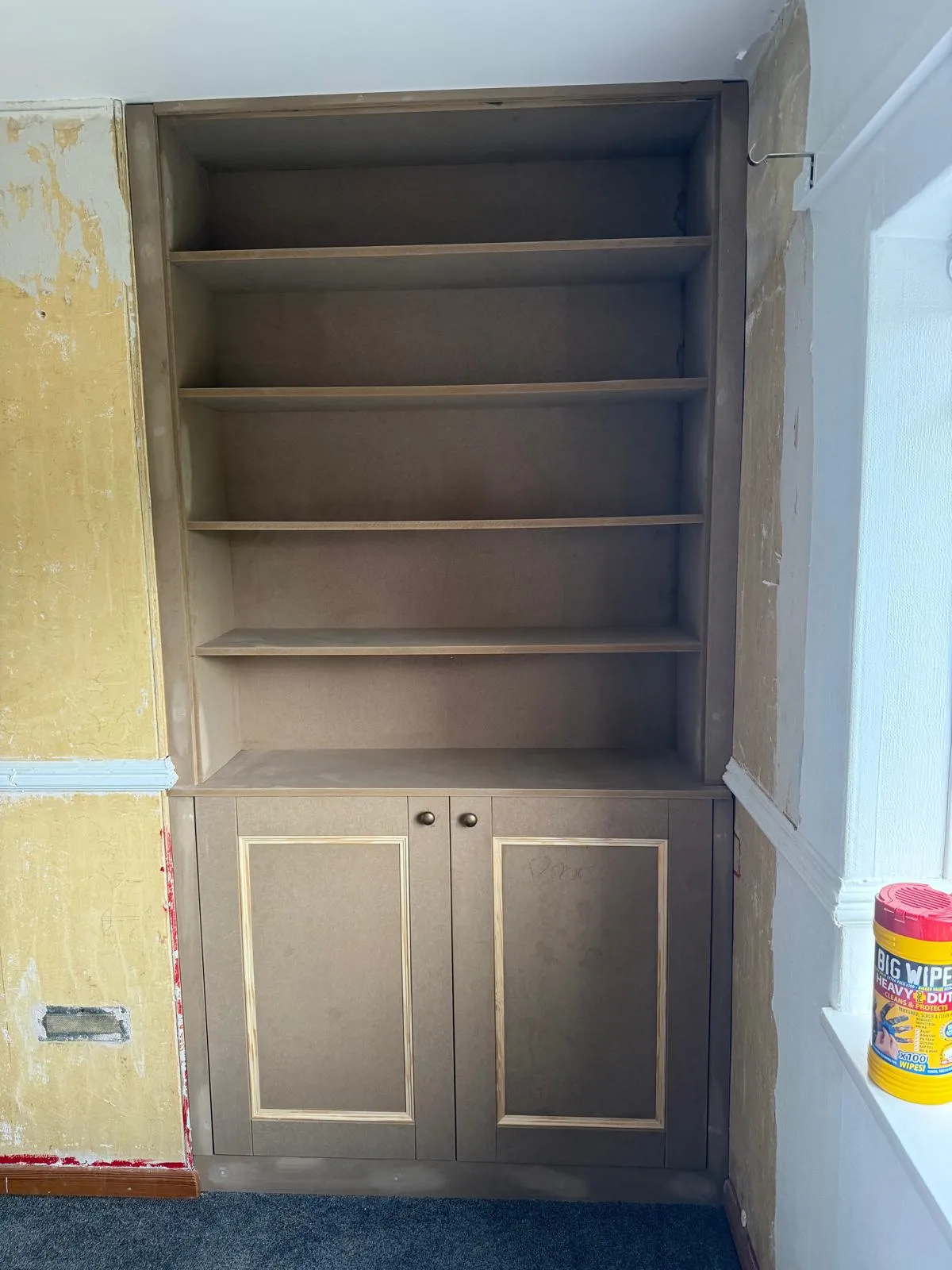 Custom alcove shelving and cupboard joinery craftsmanship