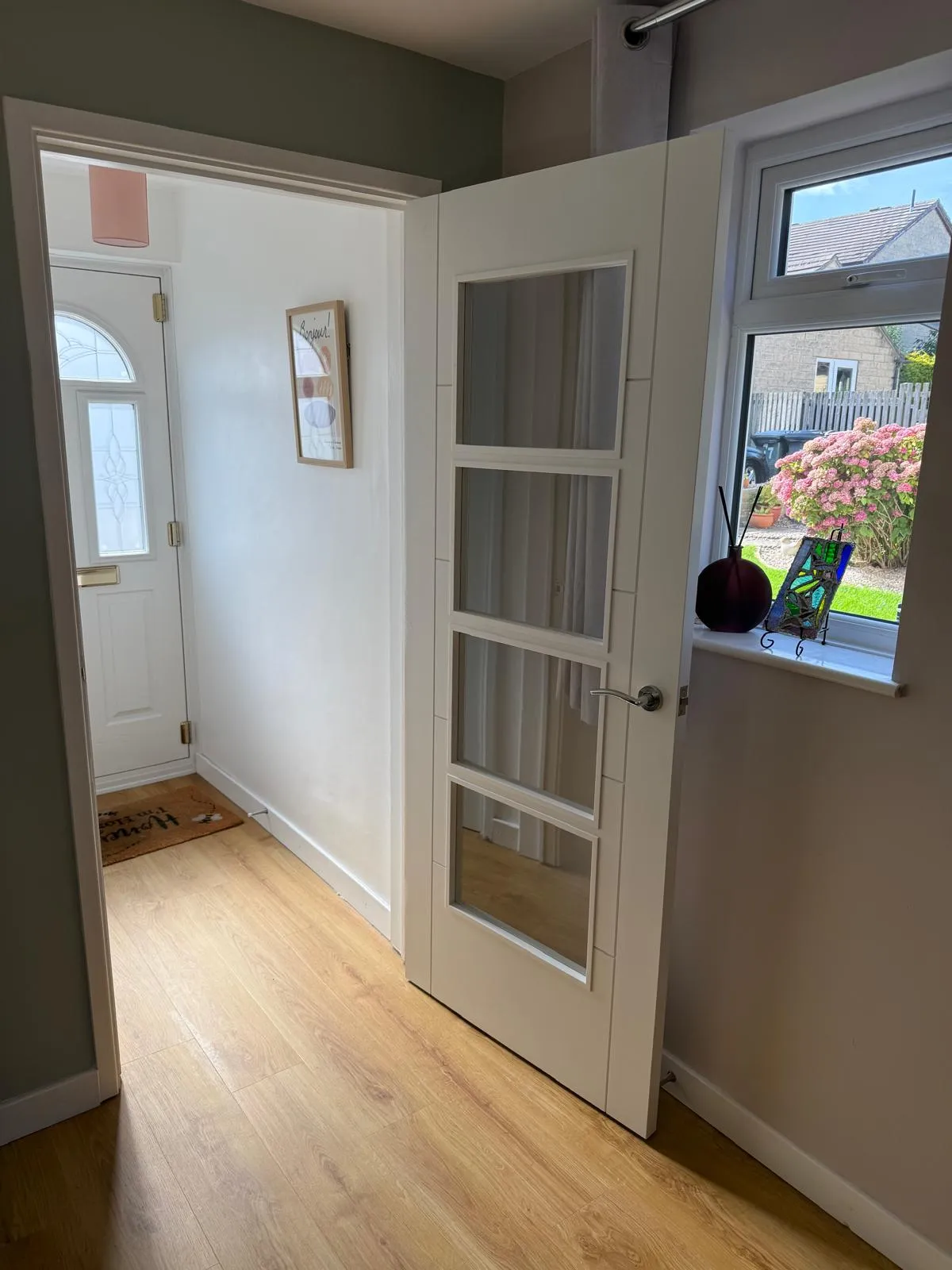 Matching glazed hallway internal doors installed in Leeds home